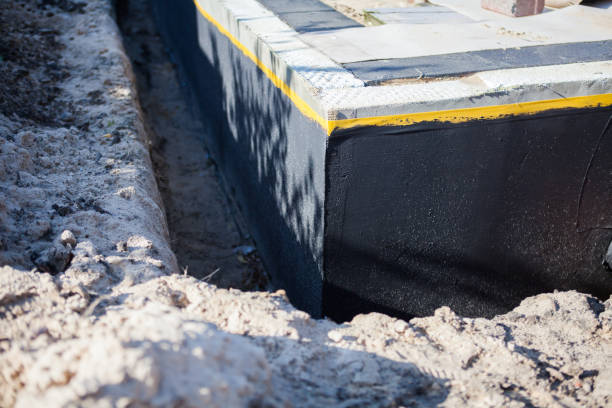 Professional Waterproofing technician working in Eclectic, AL